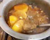 A picture of step 4 of Karachi Daigi Aloo Gosht.