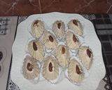 صورة لخطوة 13 من وصفة دليس جوز الهند (بنكهة الرافيللو) 🤍🥥