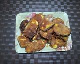 A picture of step 4 of Brinjal rava fry.