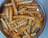 A picture of step 6 of Peri peri fries.