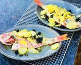 A picture of step 3 of Whole Baked Fish with potatoes and olives.