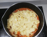 Foto del paso 4 de la receta: Tagliatella / Tallarines 🍝con tomate 🍅 y pollo empanado 🍗