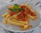 Foto del paso 5 de la receta: Patatas fritas con tomate casero