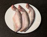 A picture of step 1 of Pabda Paturi (Pabda fish cooked in banana leaf).