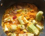 A picture of step 2 of Stuffed Ridge gourd.