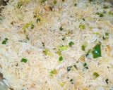 A picture of step 7 of Red Chilli Capsicum Rice.