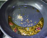 A picture of step 1 of Achari Aloo.