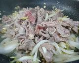 A picture of step 1 of Lemongrass Beef Noodle Salad with Egg Rolls.