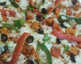 A picture of step 5 of Smoked chicken tikka flavour pizza 🍕🍕🍕🍕😋😋😋😋.
