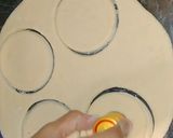 A picture of step 3 of Doughnuts.