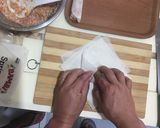 A picture of step 4 of Cheat Day Crispy pork spring rolls.