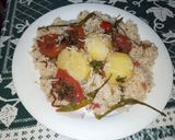 A picture of step 14 of Potato And Tomato Pulao.