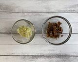 A picture of step 1 of Ajillo with Lots of Umami Taste from Shiitake Powder.