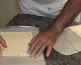 Foto del paso 2 de la receta: Trenza de hojaldre rellena de crema y frutos secos