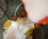 A picture of step 2 of Orange milkshake.