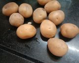 A picture of step 1 of Dahi wale baby potato.