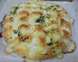 Foto del paso 7 de la receta: Pan de Ajo relleno de queso(y un truquito para tener siempre a mano perejil)