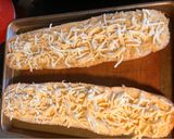 A picture of step 4 of The ABSOLUTE BEST Roasted Garlic Cheese Bread 🥖.