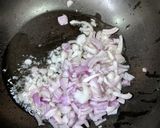 A picture of step 1 of Prawn curry.