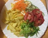 A picture of step 5 of Rosemary garlic potato wedges with salad.