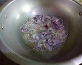 A picture of step 2 of Karahi style alu matr chicken ka salen.