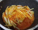 Foto langkah ke 4 dari resep Ketupat sayur labu siam santan.
