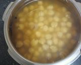 A picture of step 1 of English Jacket Potato Bar with Indian flavours.