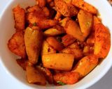 A picture of step 10 of Bihari Style Dry Parwal Aloo Masala.