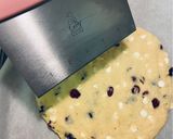 A picture of step 7 of SCONES with red berries & white chocolate chips!! 🍓🥛.