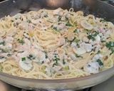 A picture of step 11 of Spaghetti with a 10-minute hot and tangy mushroom and ham sauce.