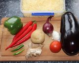 ભરેલા રીંગણનું શાક વિથ ચીઝ મસાલા (Bharela Ringan Shak With Cheese Masala Recipe In Gujarati) રેસીપી સ્ટેપ1ફોટો
