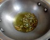 A picture of step 4 of Carrots and Tomato Bujeya.