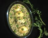 A picture of step 14 of Egg in white gravy.