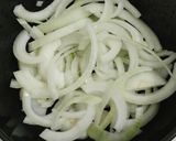 A picture of step 3 of Miso soup with tofu, daikon, onion.