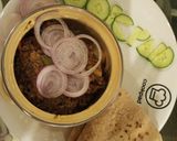 A picture of step 8 of Qeema aloo.