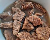 A picture of step 1 of Dabba Gosht.