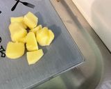 Une image de l'étape 8 de Poulet aux cacahuètes, carottes, tomates et épices.