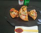A picture of step 11 of Paneer Naan Pizza.