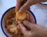 A picture of step 2 of Monaco biscuits stuffed sev puri.
