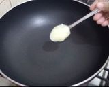 A picture of step 2 of Pop Rice Ladu.