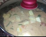 A picture of step 14 of Navratan Korma.
