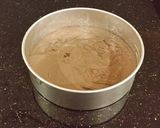 A picture of step 5 of Chocolate Layer Cake with Cherry Cheesecake Filling and Frosting.