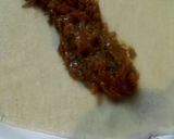 A picture of step 3 of Egg Roll wrapped barbecued shredded Chicken.