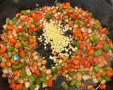 A picture of step 3 of Creole Smothered Pork Chops.