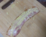 Foto del paso 4 de la receta: Perrito de salchicha fresca envuelta con papas fritas