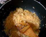 A picture of step 2 of Meat paella and chicken, fish.
