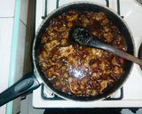 A picture of step 14 of Gizzard with rice and greens.