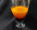 A picture of step 2 of Devil's Knight Layered Mocktail.