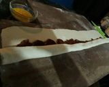 Foto del paso 3 de la receta: Rollo de hojaldre relleno de cajeta y nuez