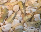 Foto del paso 4 de la receta: 🦑 Calamares con alcachofas al vino 🥂
